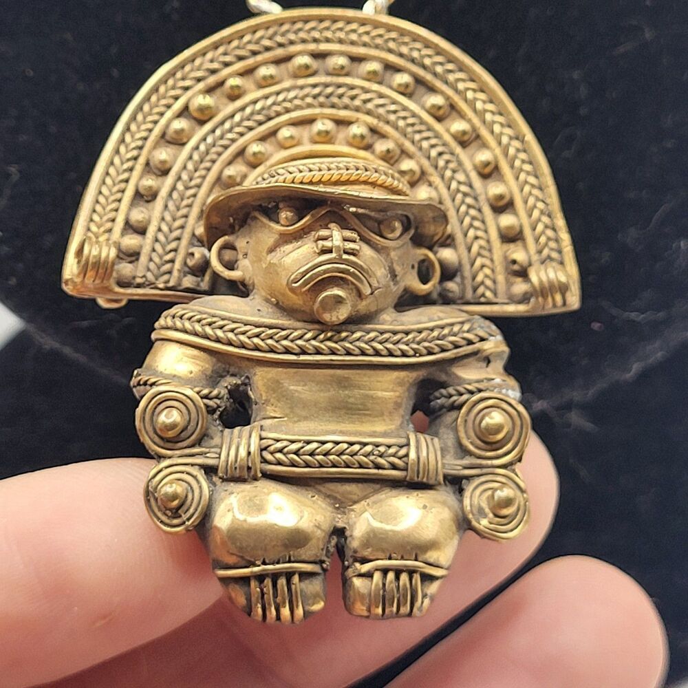 Antique Tairona culture gold masked brass figure pendant 2.25in